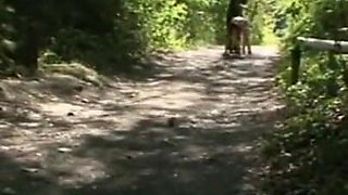 Humiliating whipping kneeling on the lake shore