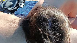 stepdaughter blows stepfather on a nudist beach