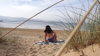 I filmed a curvy girl changing clothes and doing exercises on the beach.