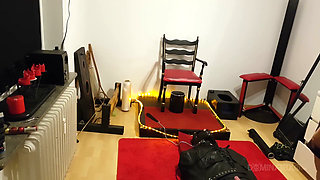 Curvy Brunette Dominatrix Commands Bound Slave in Fetish Dungeon
