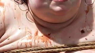 Humiliated BBW Slave Tied and Stuffing Her Belly Deep
