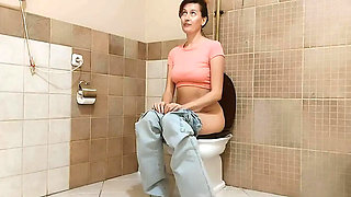 Backstage: Hairy Redhead MILF Peeing and Wiping Her Wet Pussy
