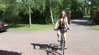 Hot ass blonde gets fucked while holding her bicycle