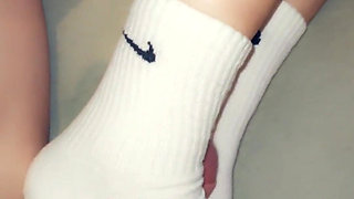 Footjob in Long Socks and Cums on Socks