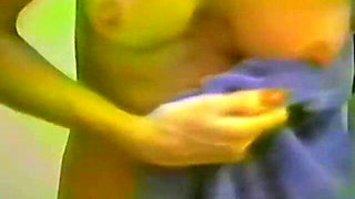 Sexy Chick Undresses and Takes a Shower