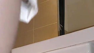 Cute and Hot Sexy Tight Pussy Cheerleader Shows Her Shaved and Wet Pussy Under Her Mini Skirt in the Bathroom