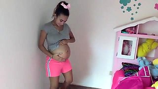 Pregnant teen putting her beautiful curves on display