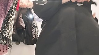 Sexy mommy Mirsur tries on some panties while eyeing a hairy milf with big tits and a big ass
